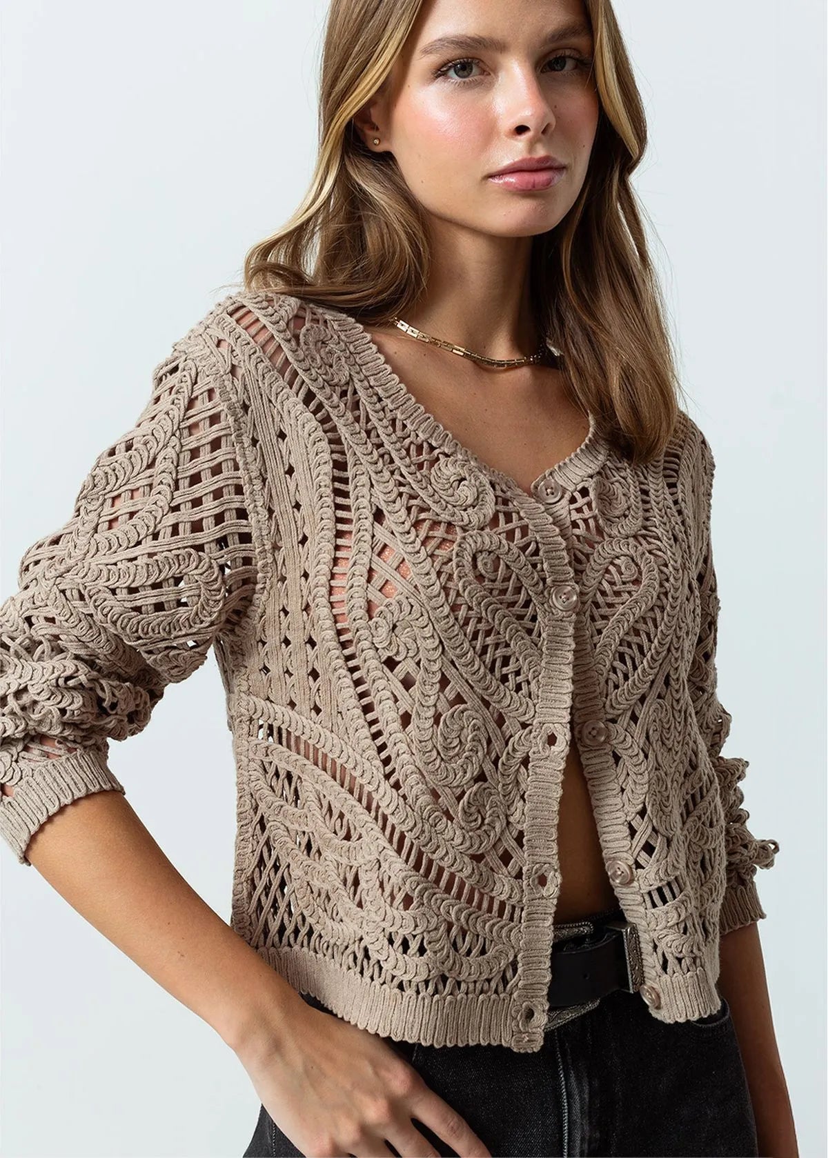 Open design woven sweater