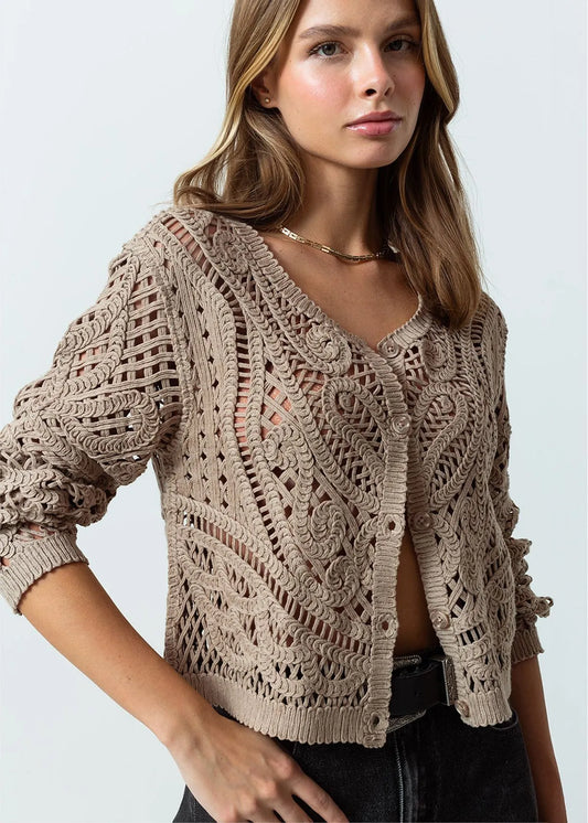Open design woven sweater