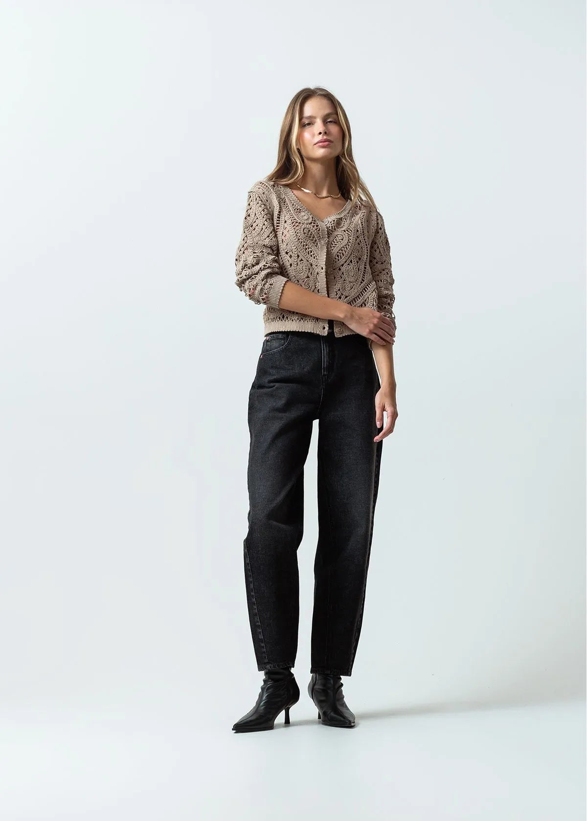 Open design woven sweater