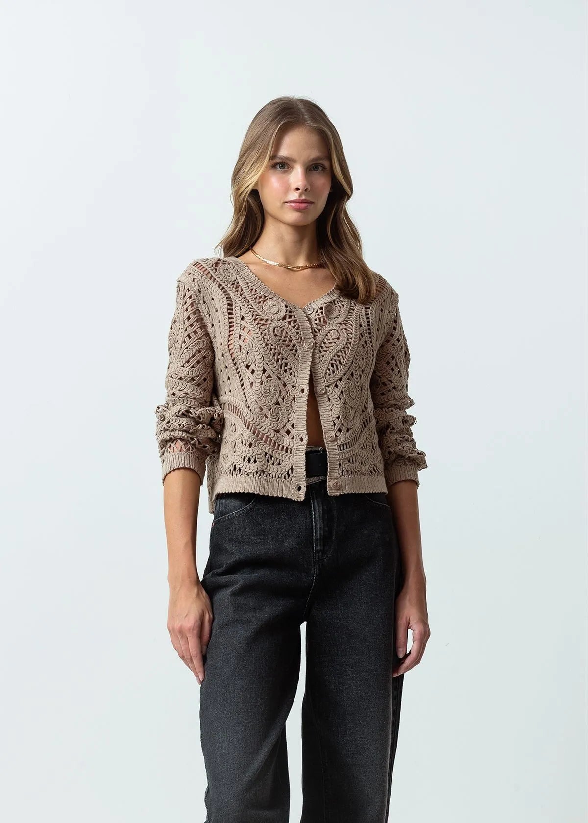 Open design woven sweater
