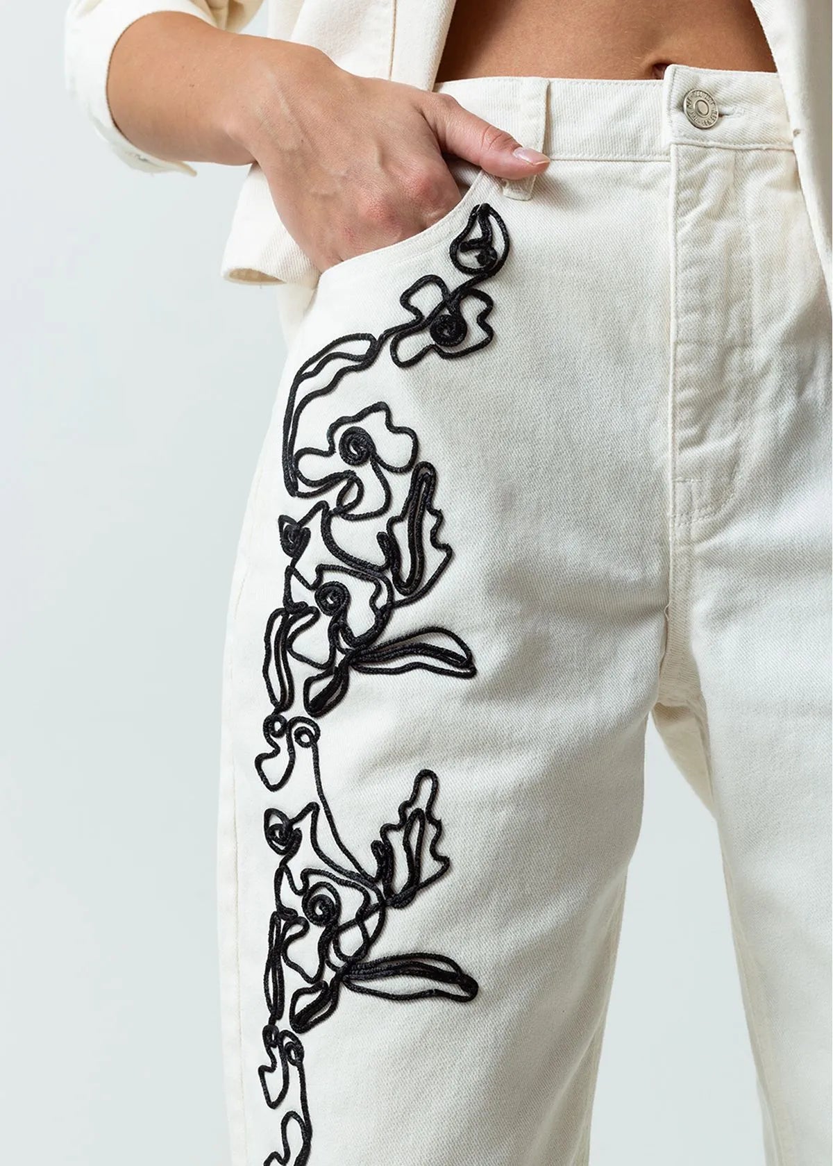 Baggy pants with embroidered cord detail