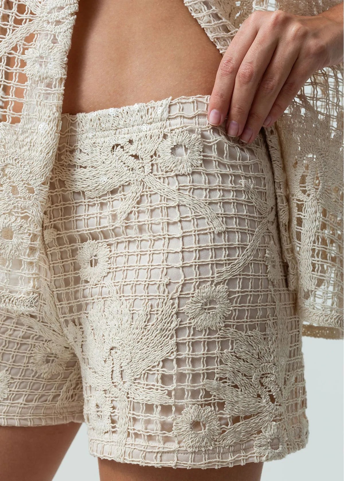 Shorts with woven details
