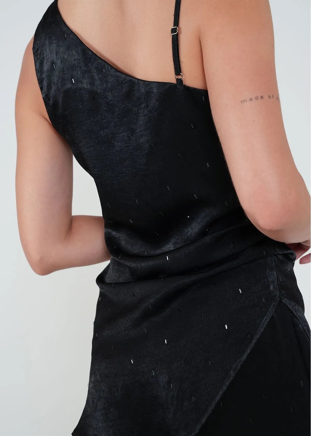 Shirt with asymmetrical design