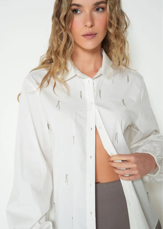 Long sleeve shirt with decorative appliques