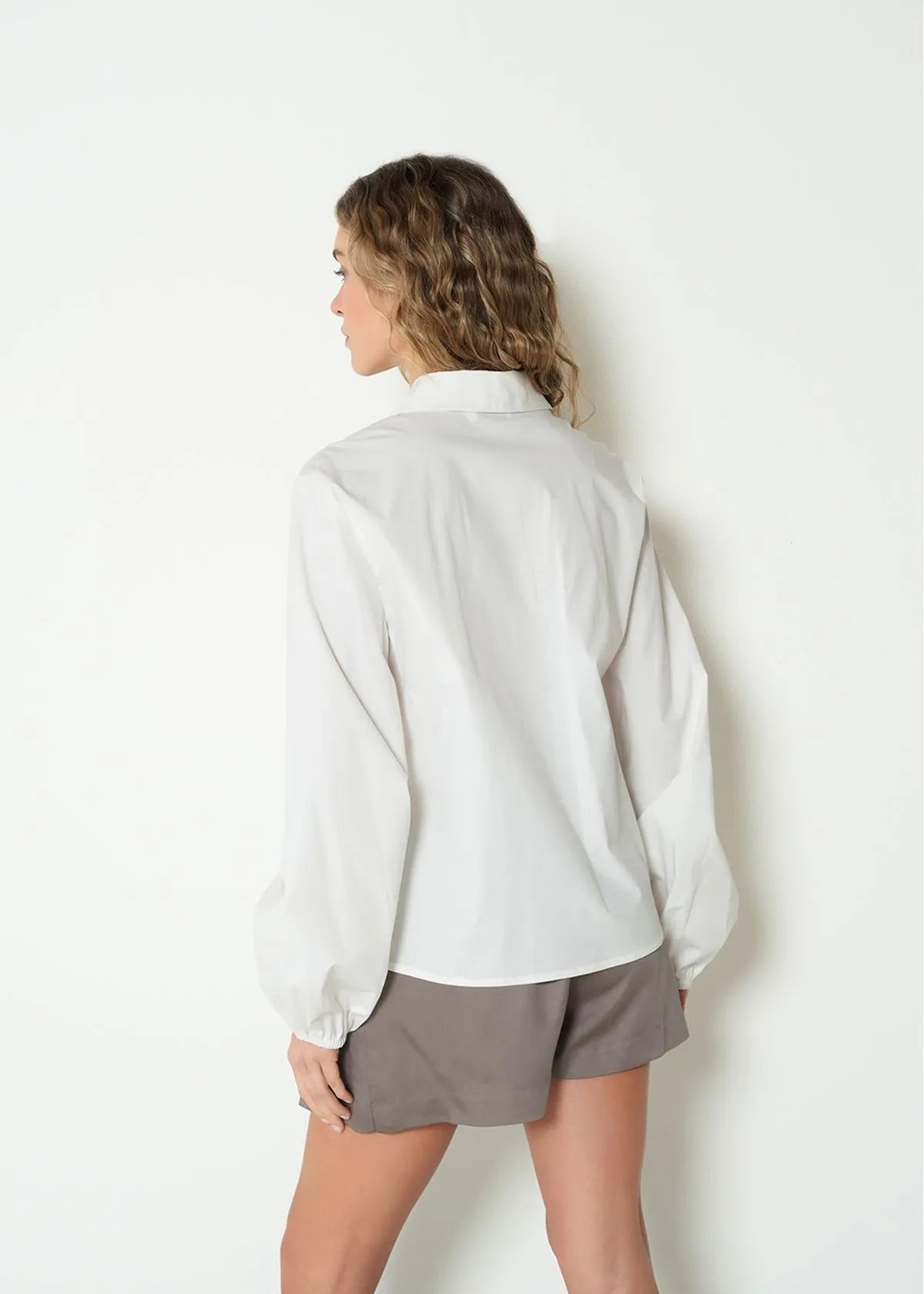 Long sleeve shirt with decorative appliques