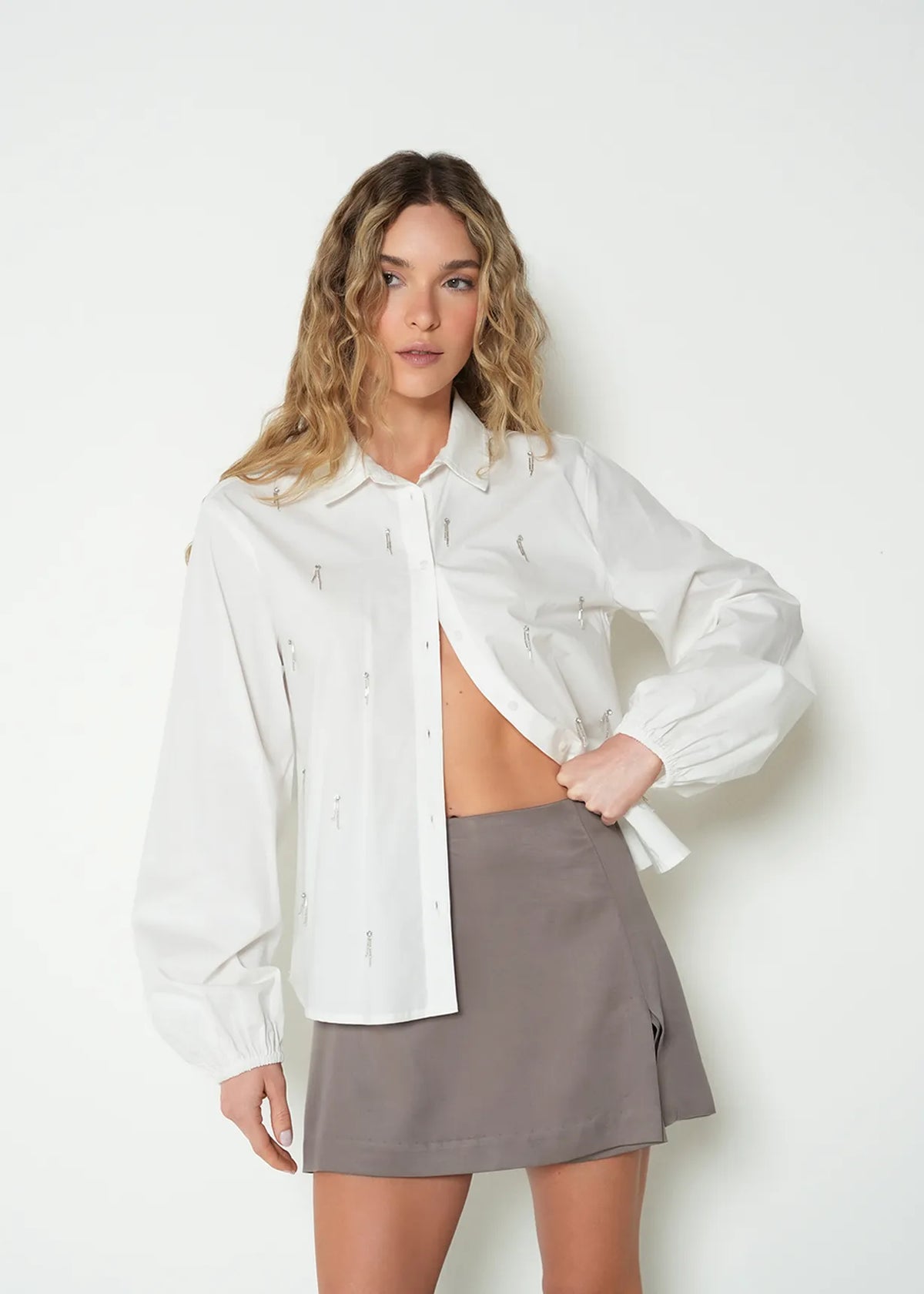 Long sleeve shirt with decorative appliques