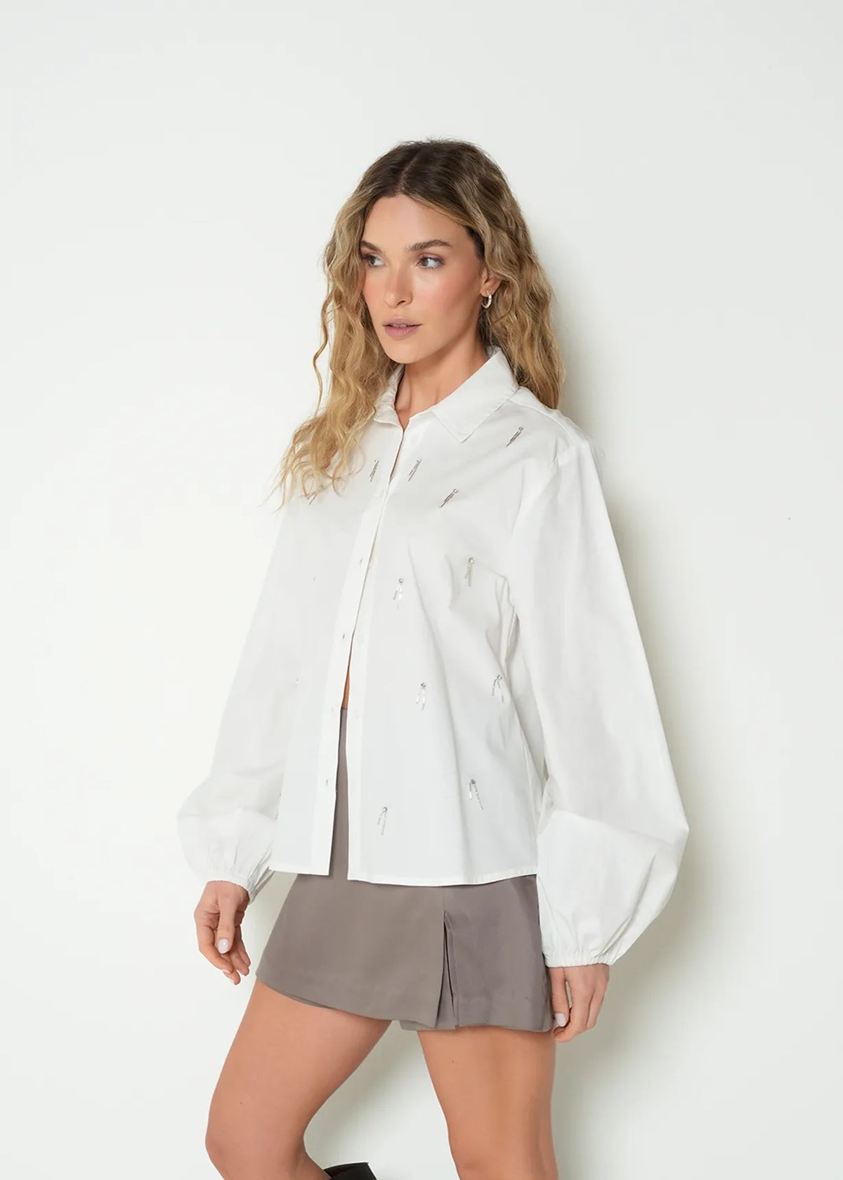 Long sleeve shirt with decorative appliques