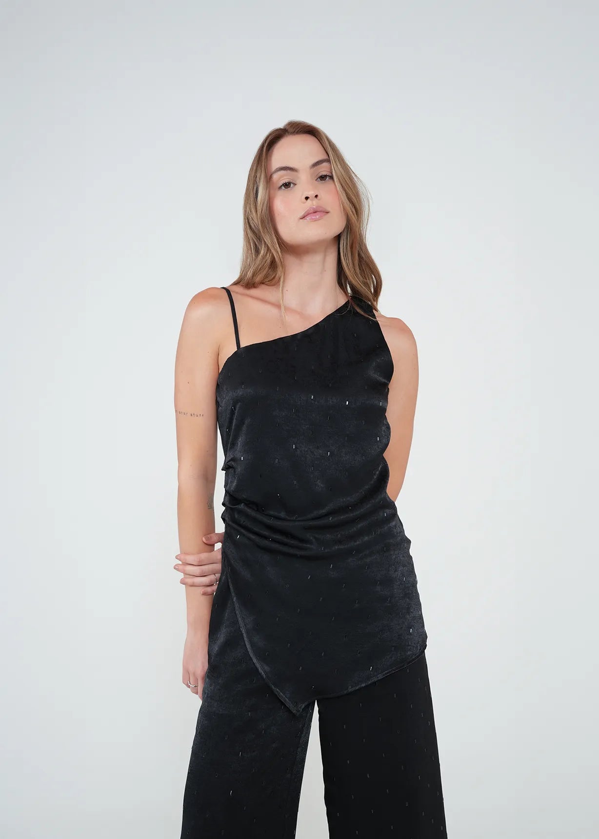 Shirt with asymmetrical design