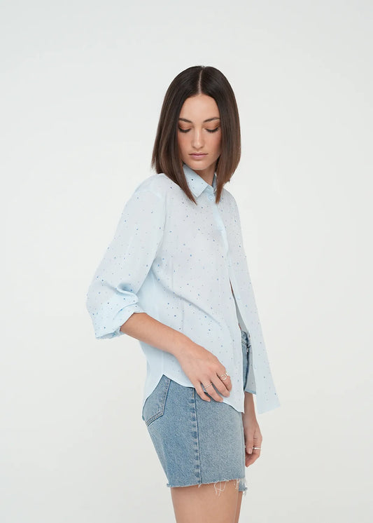 Shirt with shiny appliques