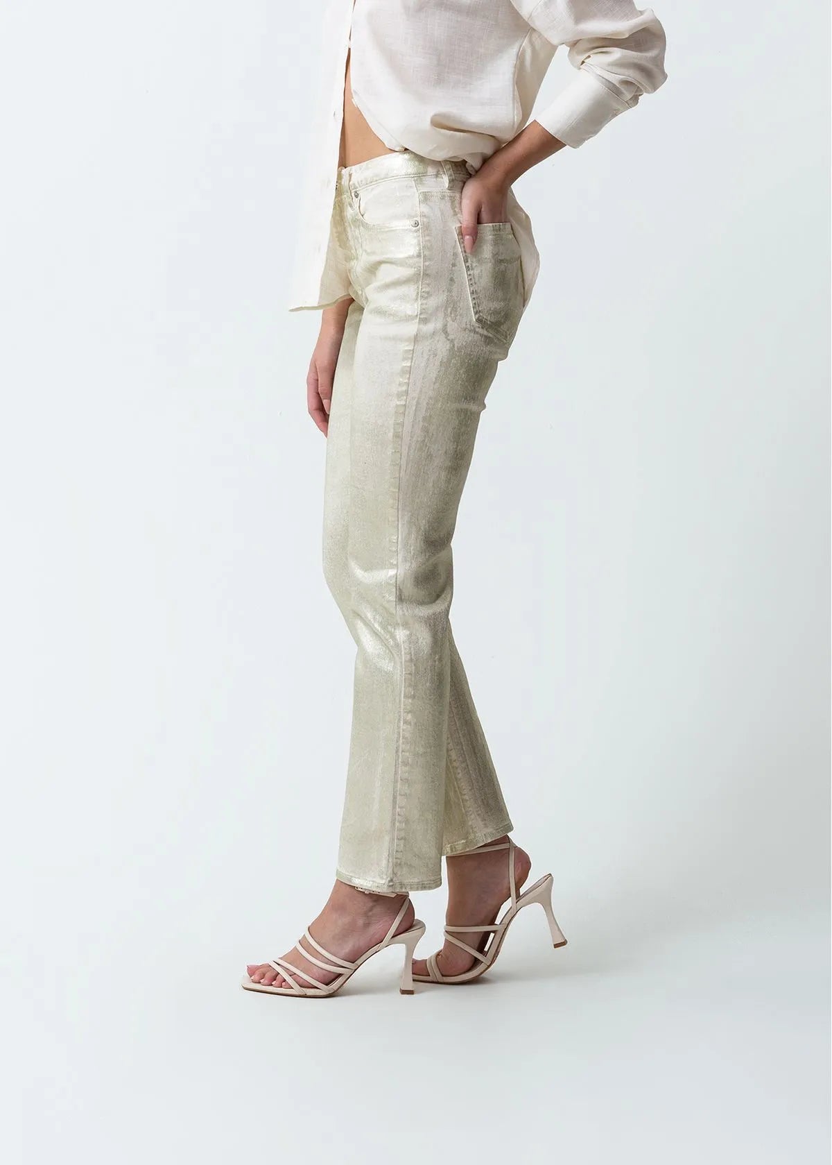 Trousers with metallic effect
