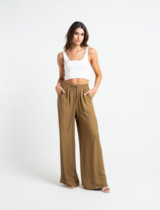 Palazzo fit pants. • Super high rise. • Flowing fabric.