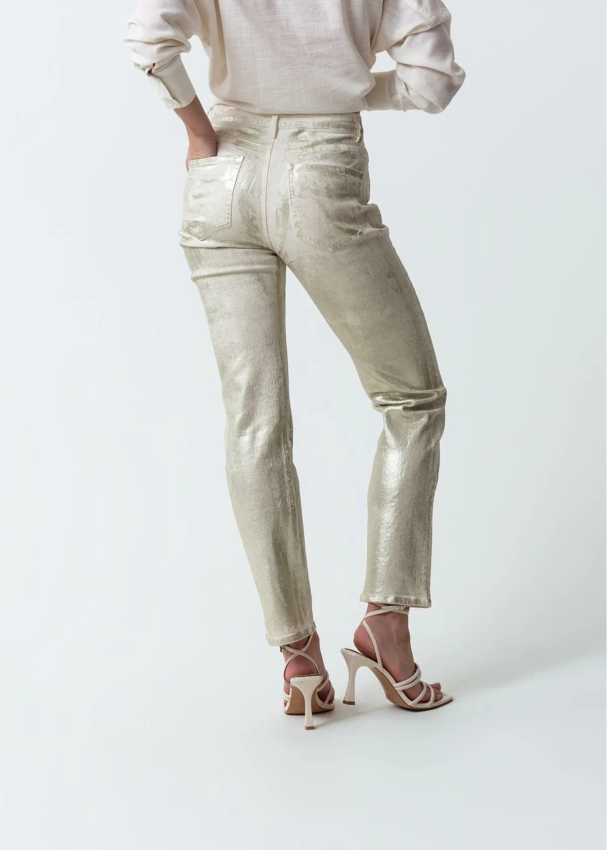 Trousers with metallic effect