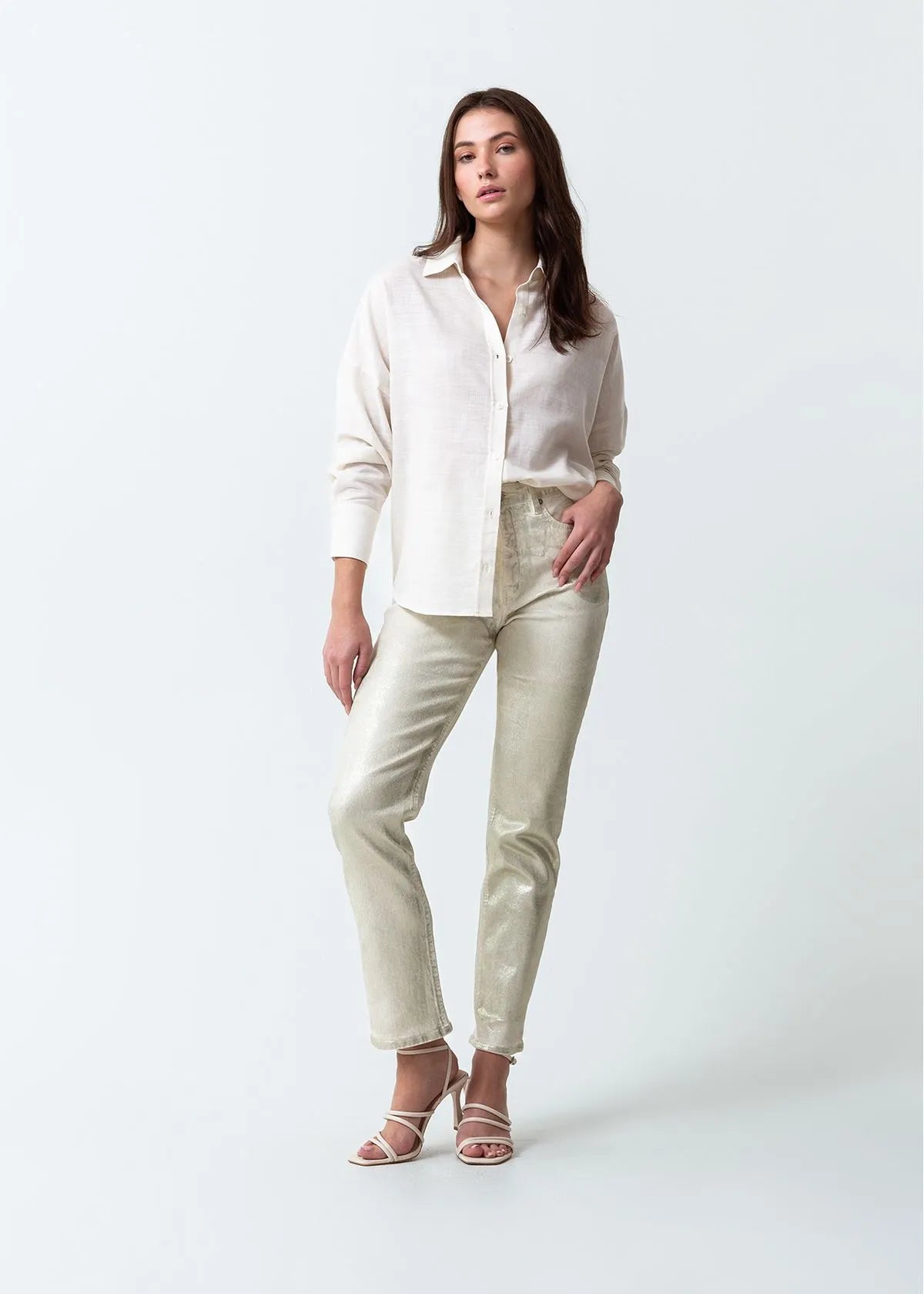 Trousers with metallic effect