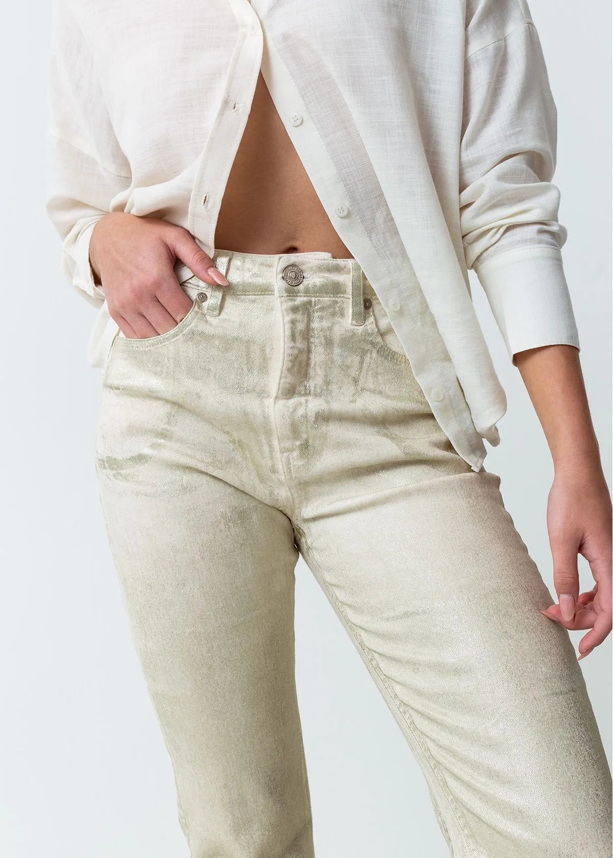 Trousers with metallic effect