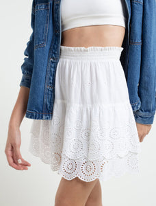 Skirt with untied details  • Short.  • Flowing fabric.