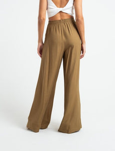 Palazzo fit pants. • Super high rise. • Flowing fabric.